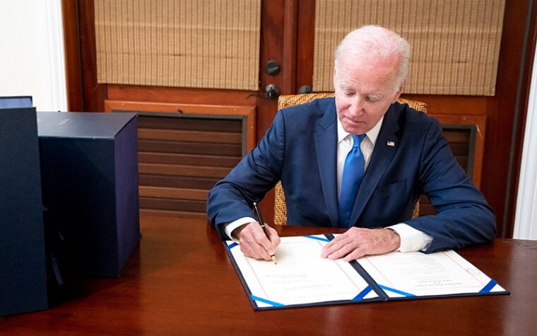 President Biden signing the final appropriations legislation for fiscal year 2023