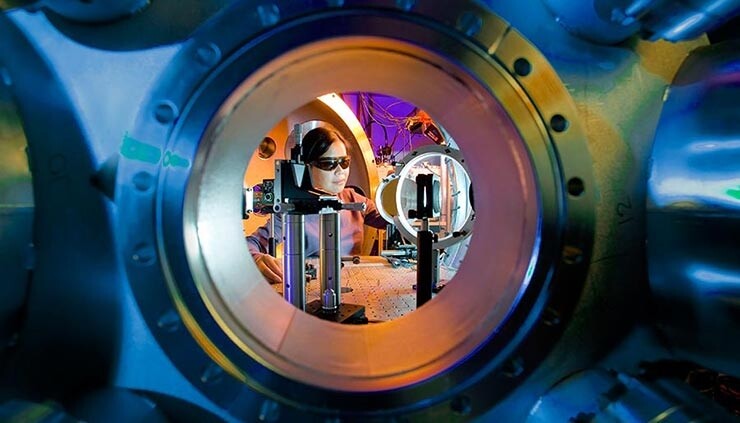 A physicist sets up a target for a petawatt laser experiment at the Jupiter Laser Facility at Lawrence Livermore National Laboratory. 