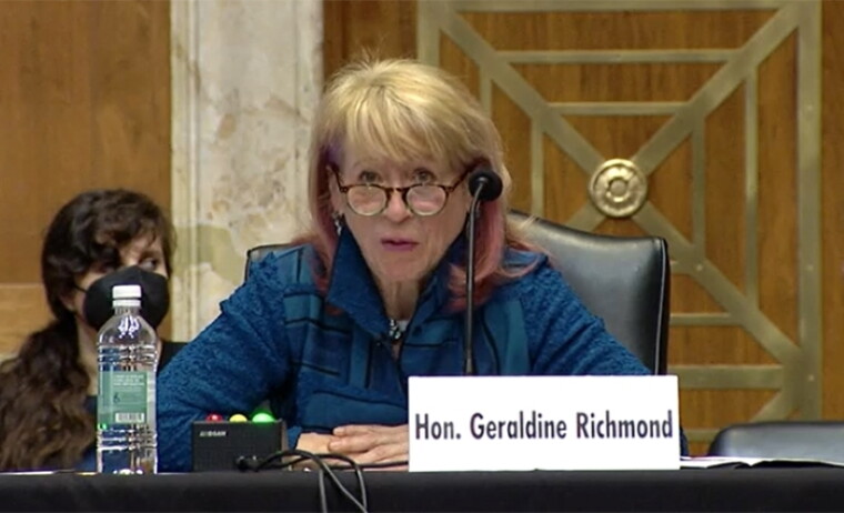 Geri Richmond, seated and looking straight ahead during a Senate hearing.