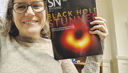 Emily Conover holds an issue of Science News magazine. Photo courtesy of Emily Conover.