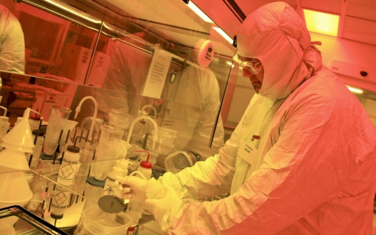 A researcher fabricates a component of a quantum photonic circuit at Oak Ridge National Lab’s Center of Nanophase Materials Sciences