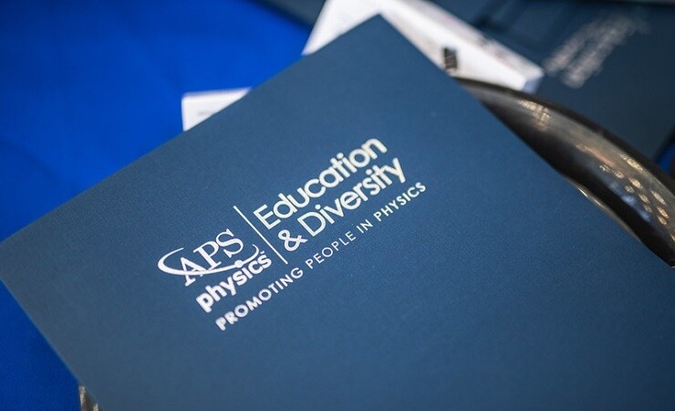 A folder reading "APS Physics Education & Diversity: Promoting People in Physics"