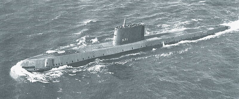 USS Nautilus (SS-571), the US Navy's first nuclear-powered submarine, on its initial sea trials, 10 January 1955. Public domain.