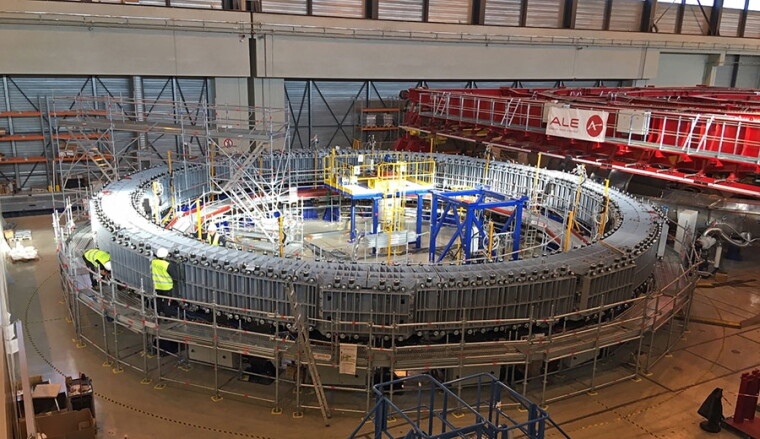 Construction is underway on magnetic coils for the ITER tokamak facility, an international project to investigate the prospects for generating energy from magnetically confined plasmas.