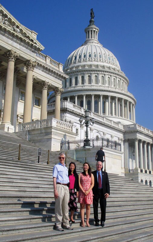 John Mather, Stankus, SPS intern Nikki Sanford, and Rep. Bill Foster (left-to-right) stand on the steps of the United States Capitol. Photo courtesy of Katherine Stankus.