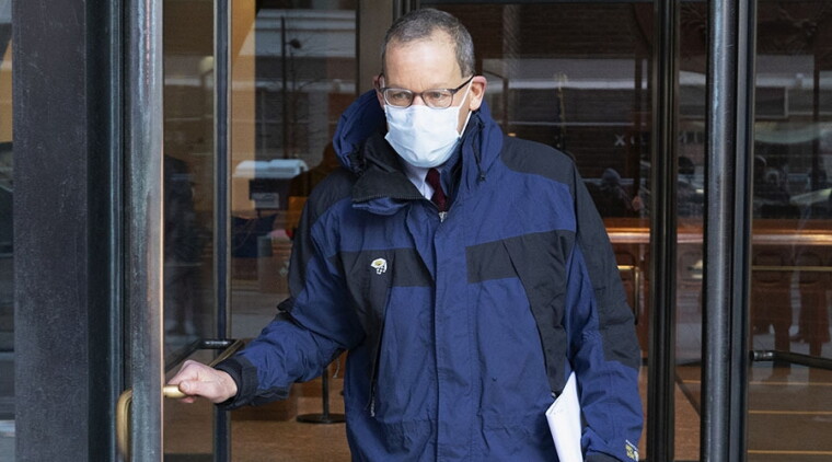 Charles Lieber exits courtroom