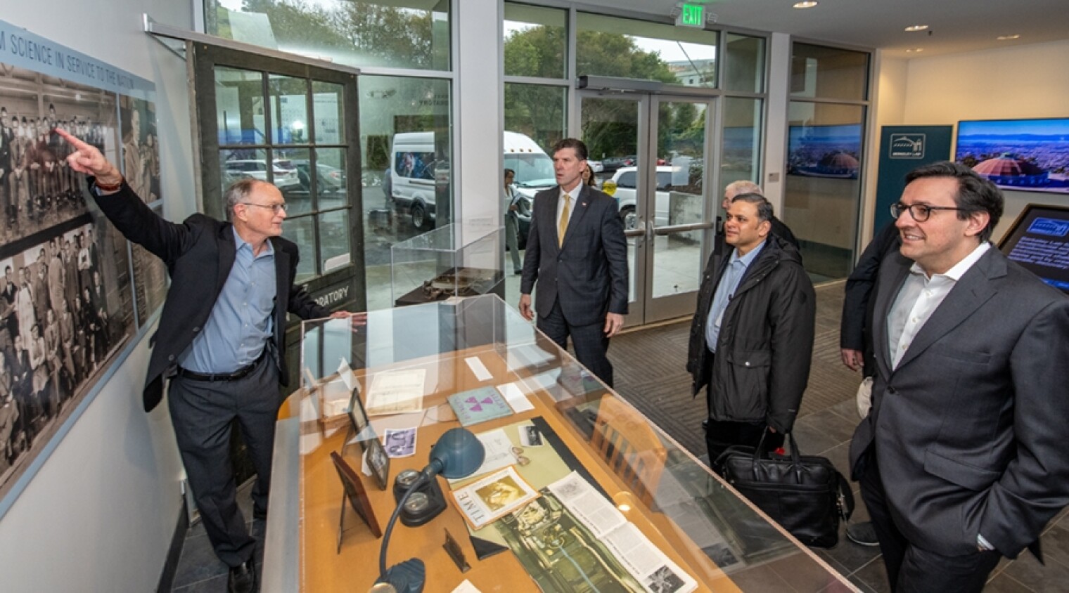 Lawrence Berkeley National Lab Director Michael Witherell, left, leads PCAST members and staff on a tour of the lab in January. A.N. Sreeram, second from right, is the chair of the council’s Subcommittee on New Models of Engagement for Federal and Nationa