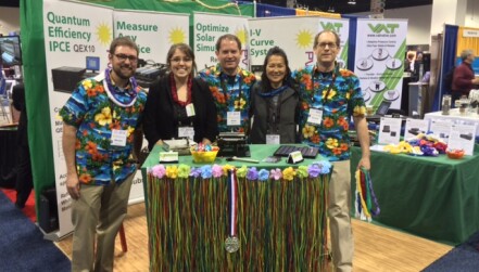 Warecki in the exhibit hall with exhibits and classmate  Kyle Sherbert (right).